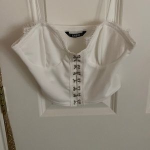 Size small white button up top from shein!